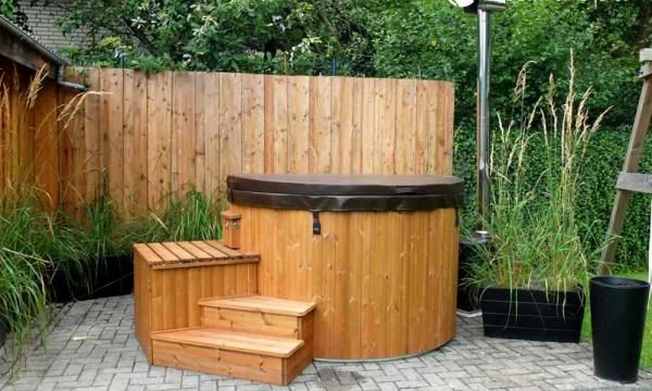 Садовая ванна с дровяной, электрической или газовой плитой? Как выбрать?